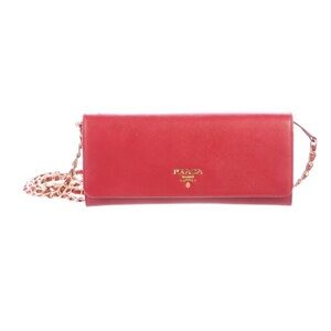 Red Saffiano leather Prada Metal wallet on chain.
